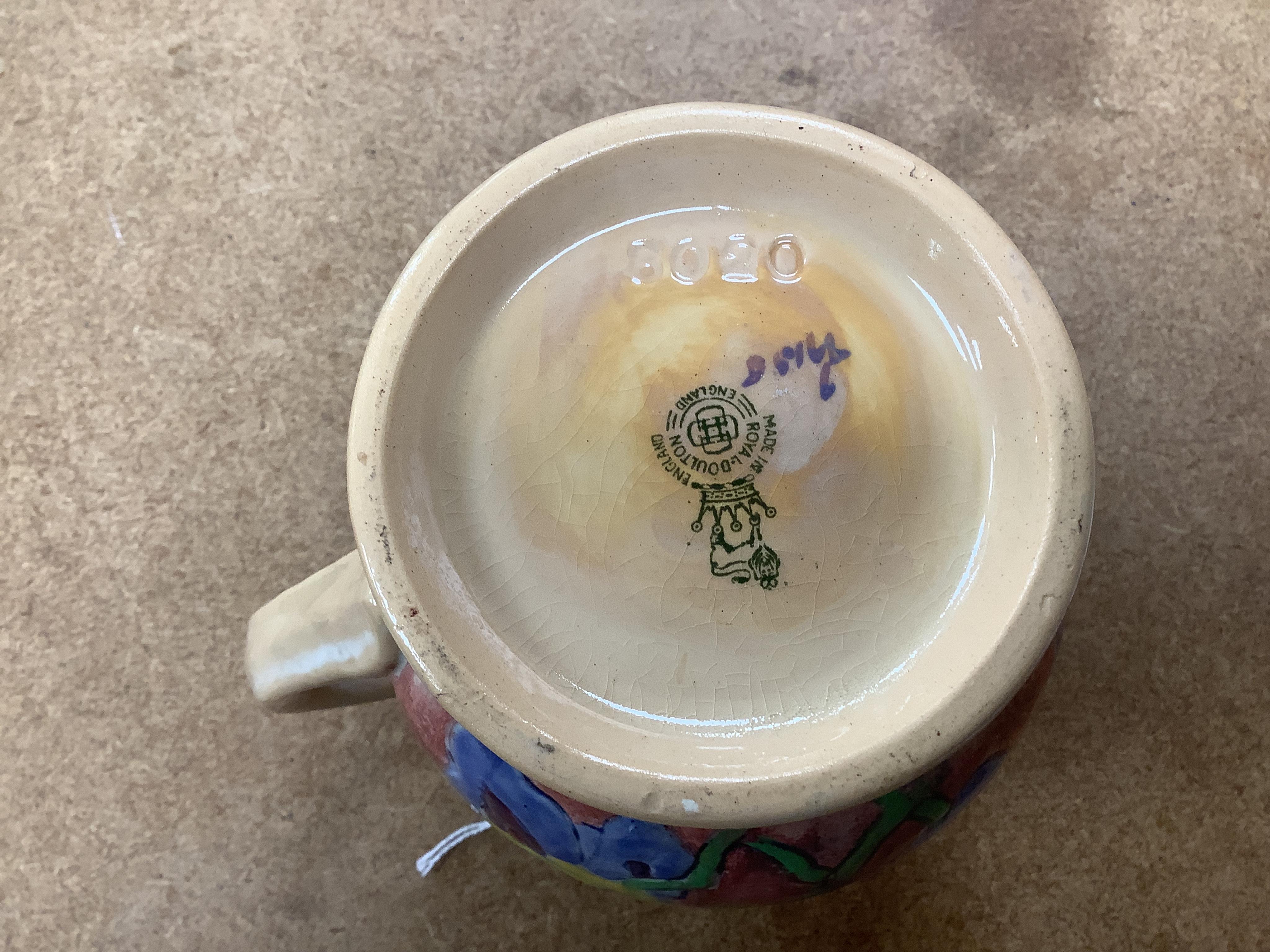 A Royal Doulton pottery jug, designed by Frank Brangwyn, numbered 8020, 15cm high